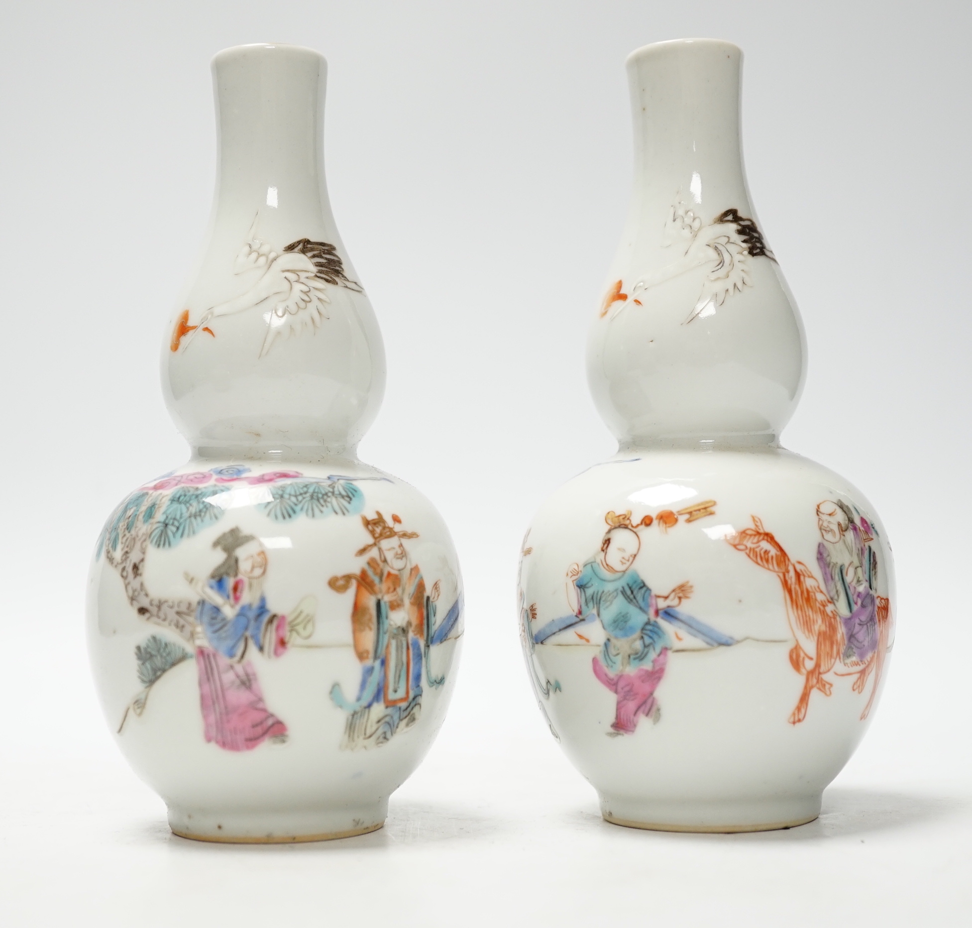 A pair of Chinese double gourd shaped vases and a small ginger jar, vases 15cm (3)